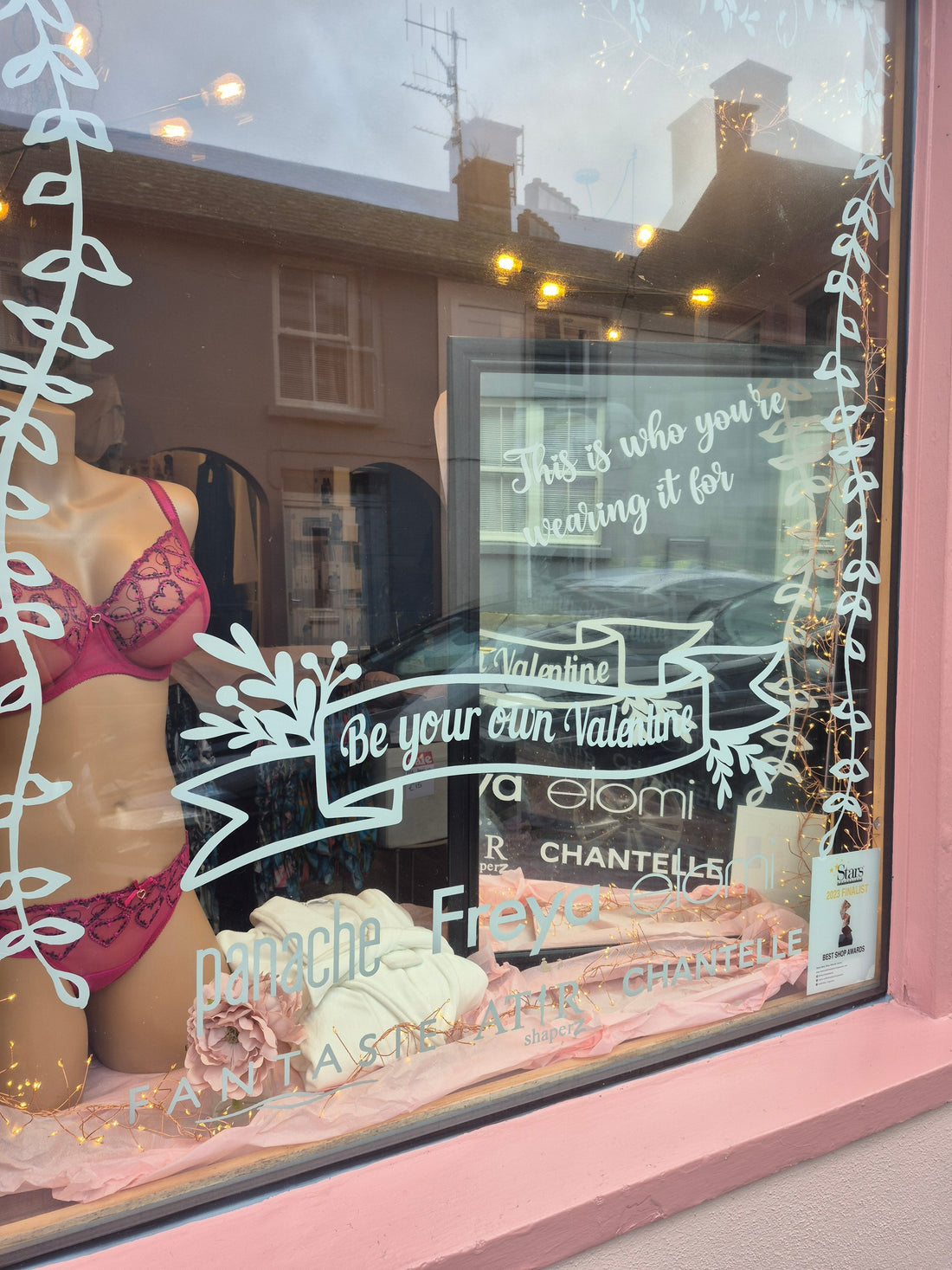 Valentine’s lingerie window display at The Lady’s Slip Lingerie boutique in Tramore featuring “Be Your Own Valentine” message