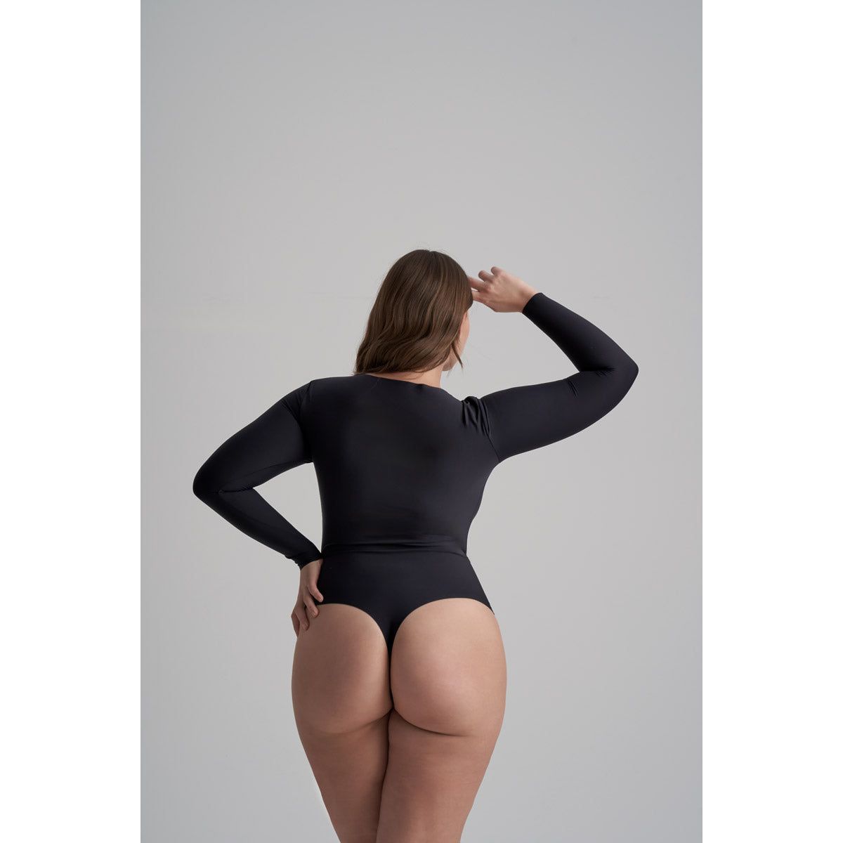 Long sleeved shaping bodysuit